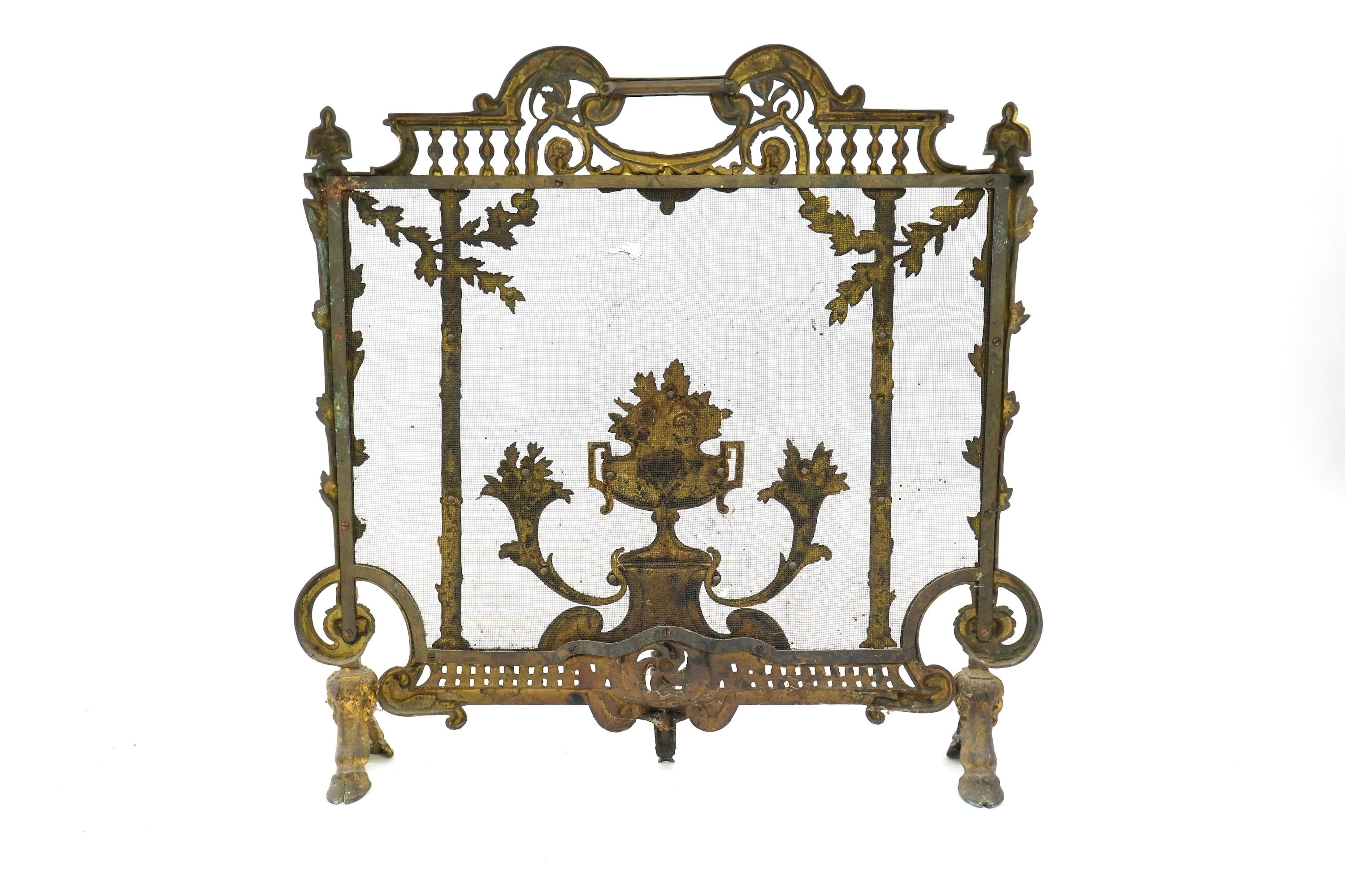 A Louis XVI style gilt bronze and iron mesh fireguard, late 19th century
